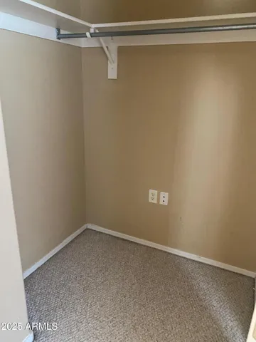 a view of a room with racks on the wall