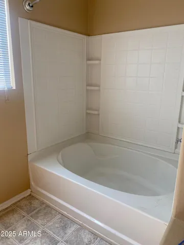 a bathroom with a bathtub