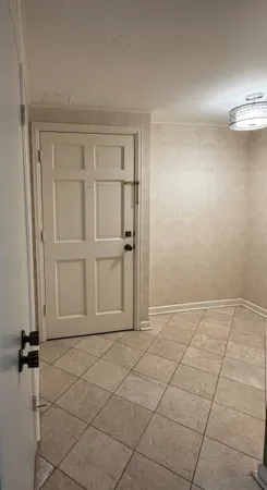 a kitchen with stainless steel appliances a stove a microwave and a refrigerator