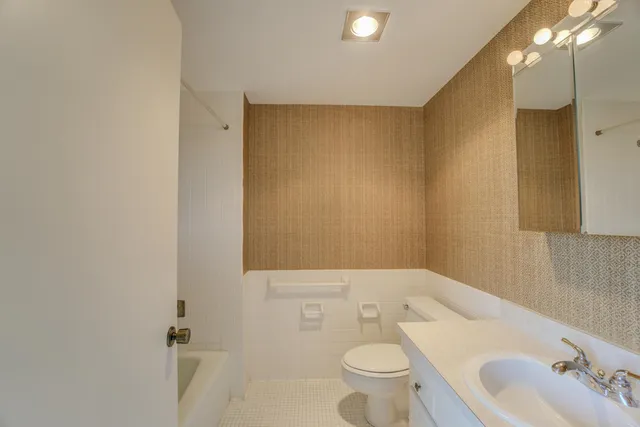 a view of a livingroom with wooden floor