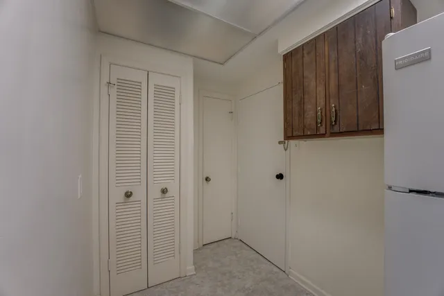 a room with a bed and a window