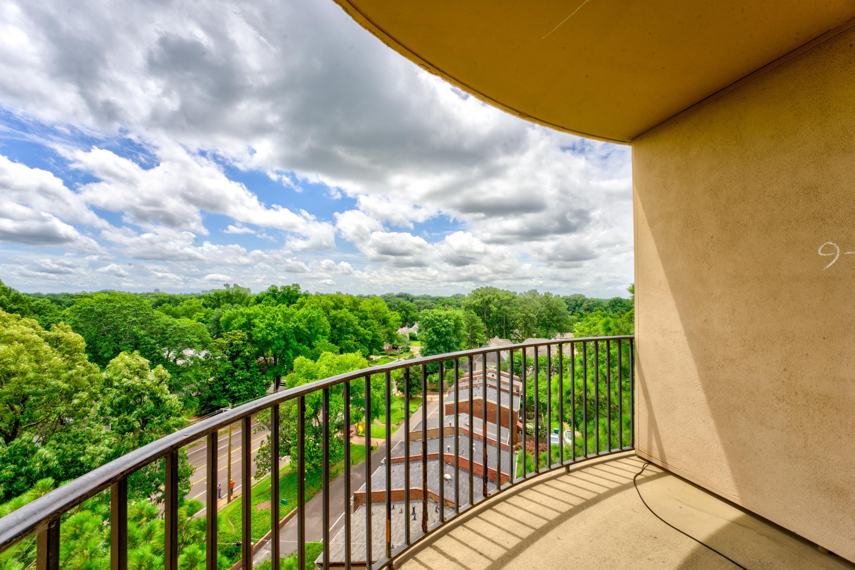 475 North Highland Street, Unit 9AB Memphis, TN 38122 - Photo 33 of 40 a view of a balcony with a yard