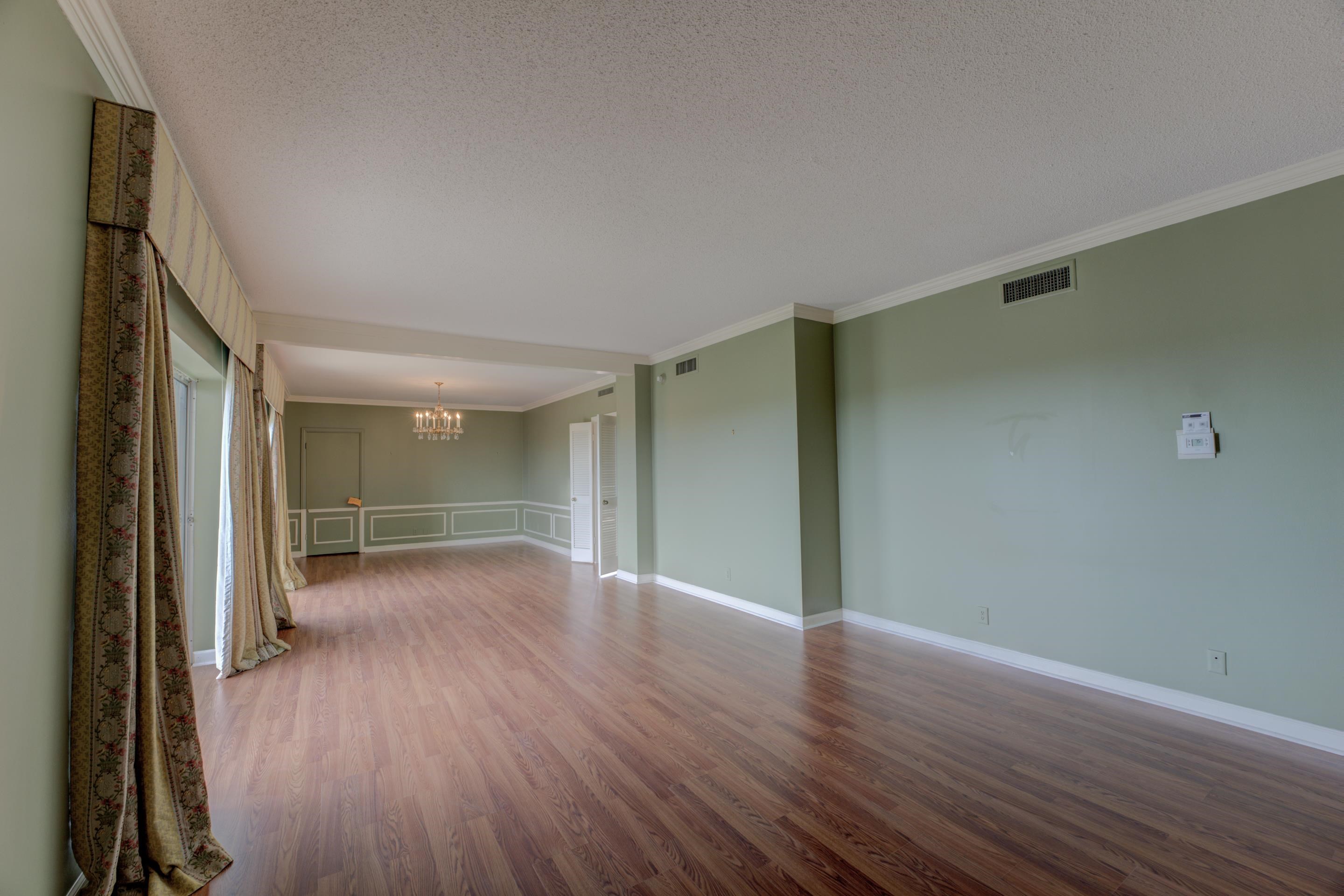 475 North Highland Street, Unit 9AB Memphis, TN 38122 - Photo 7 of 40 a view of a room with wooden floor and window