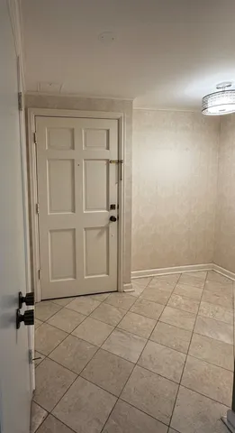 a kitchen with stainless steel appliances a stove a microwave and a refrigerator