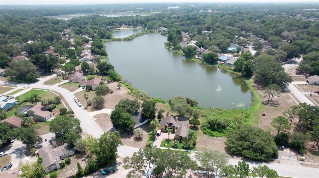 an aerial view of lake residential house with outdoor space