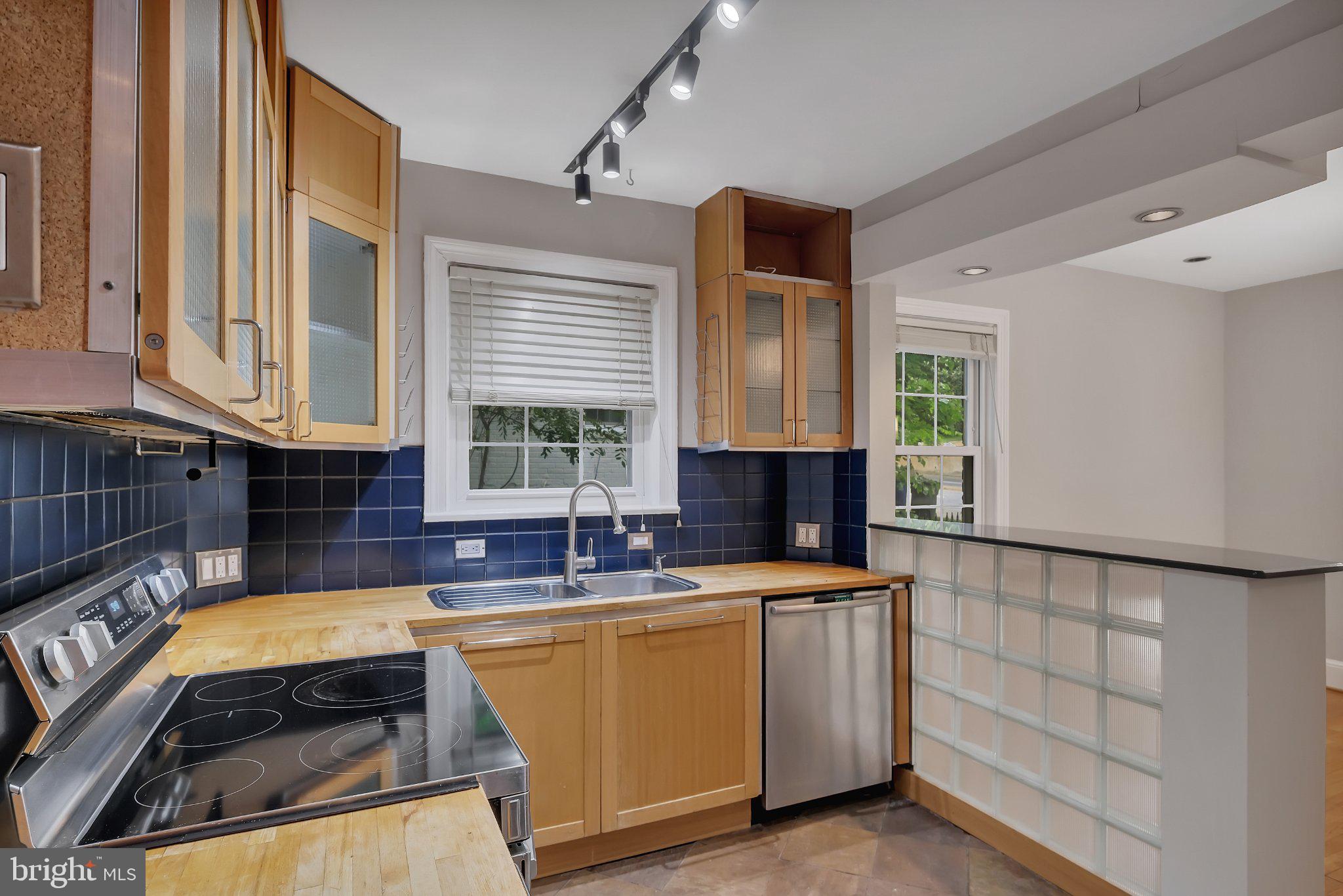 1706 North Glebe Road Arlington, VA 22207 - Photo 14 of 36 Modern kitchen with sleek finishes.