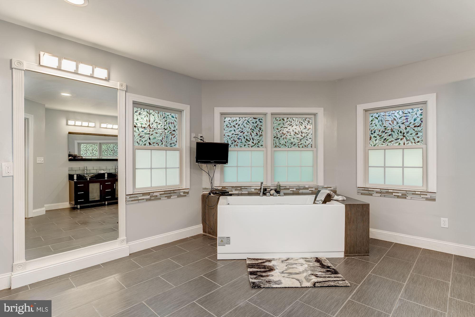 10830 Braeburn Road Columbia, MD 21044 - Photo 20 of 29 Relax in this hi-tech jacuzzi tub and tv