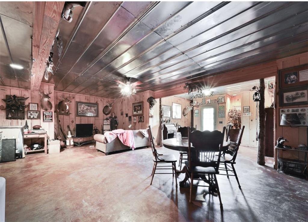 1523 Braswell Mountain Road Dallas, GA 30132 - Photo 19 of 34 a view of a dining room with furniture window and outside view