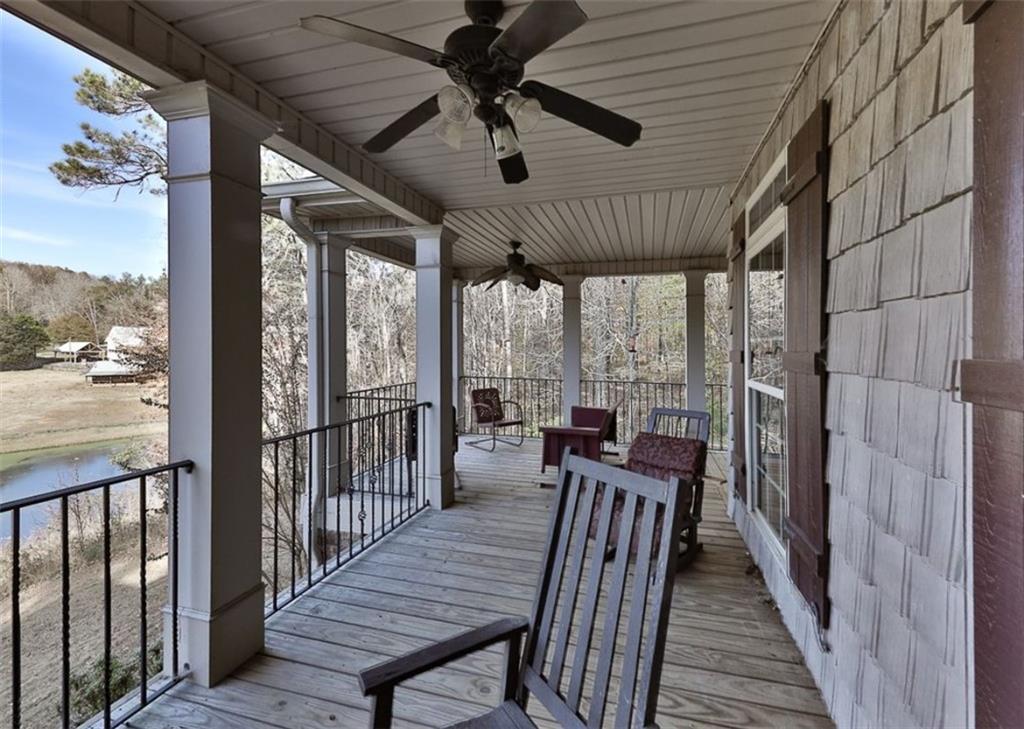 1523 Braswell Mountain Road Dallas, GA 30132 - Photo 24 of 34 a view of a balcony with furniture