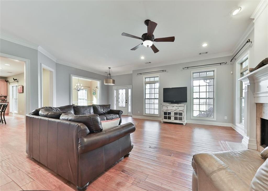1523 Braswell Mountain Road Dallas, GA 30132 - Photo 3 of 34 a living room with furniture and a flat screen tv