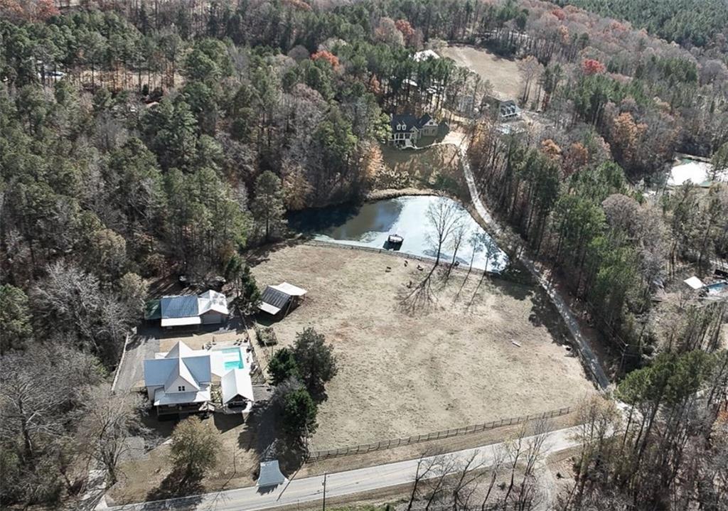1523 Braswell Mountain Road Dallas, GA 30132 - Photo 33 of 34 an aerial view of residential houses with outdoor space