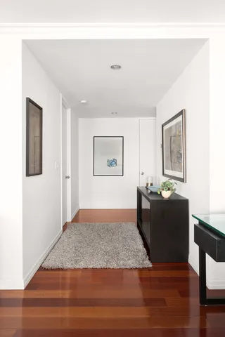 a living room with a couch and a window