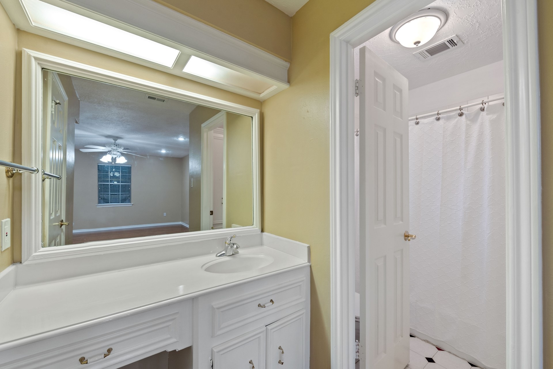 9719 Godstone Lane Spring, TX 77379 - Photo 14 of 19 One of the secondary bathrooms upstairs has separate sink and shower areas.