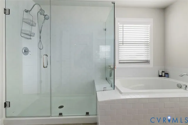 a bathroom with a sink and a window