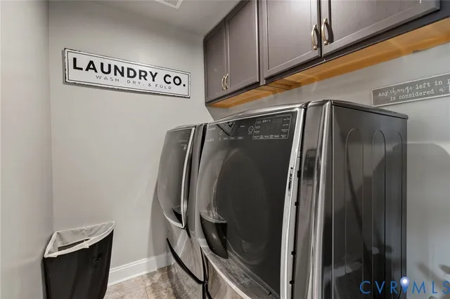 a bedroom with a large bed and a large window