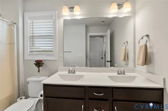 swimming pool view with a seating space