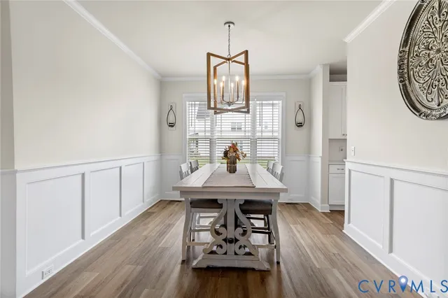 a kitchen with stainless steel appliances sink refrigerator and cabinets