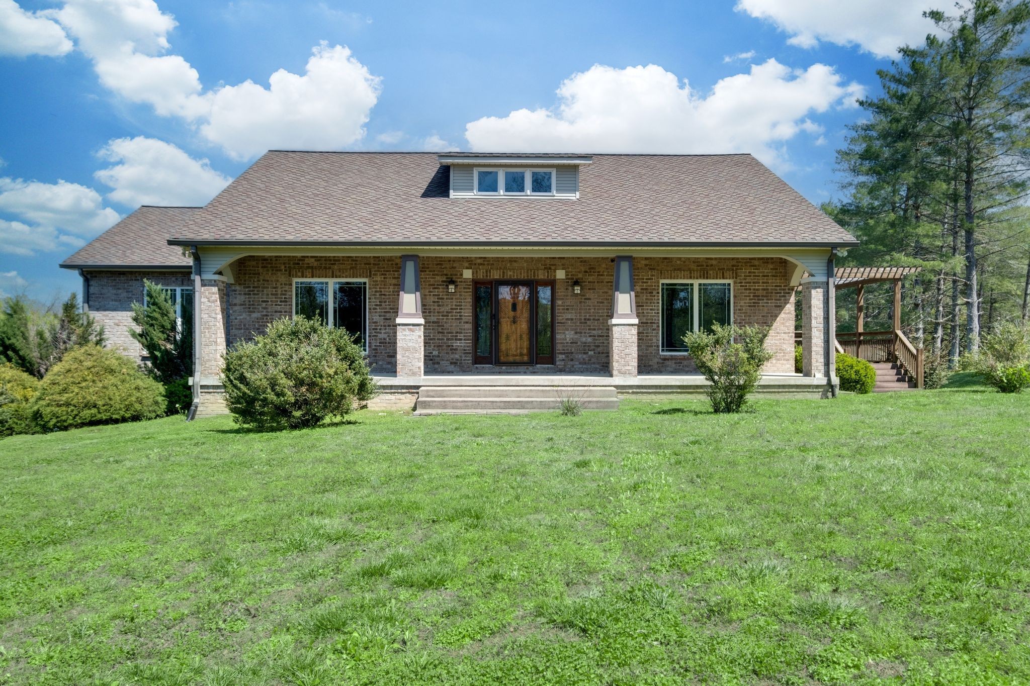 1249 White Road Bon Aqua, TN 37025 - Photo 5 of 60 a view of a house with garden