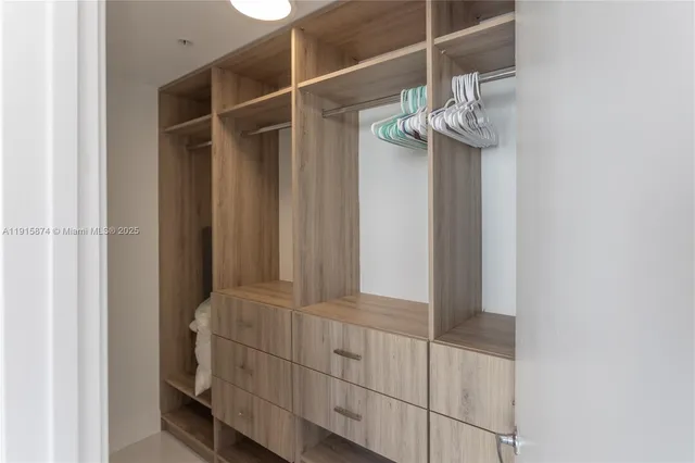 a view of a room with racks on the wall