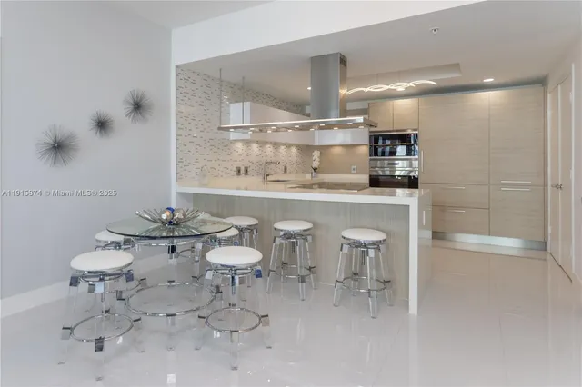 a bathroom with a sink toilet and a mirror