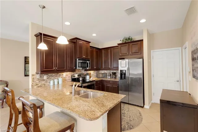 $449,900 | 15116 Summit Pl Circle, Unit 213, Naples, FL 34119