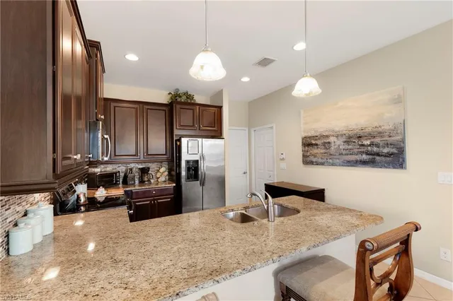 $449,900 | 15116 Summit Pl Circle, Unit 213, Naples, FL 34119