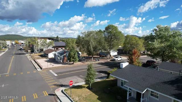 a view of houses with yard