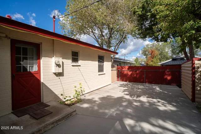 a front view of a house with yard