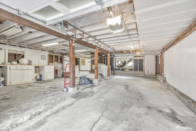 a view of a room with wooden roof