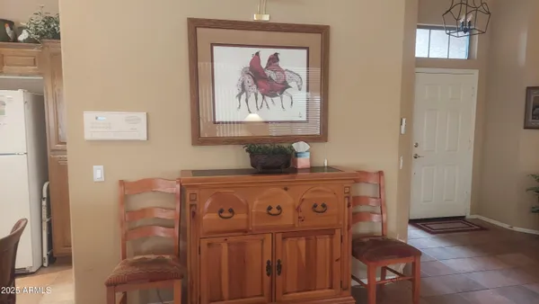 a view of hallway that has closet