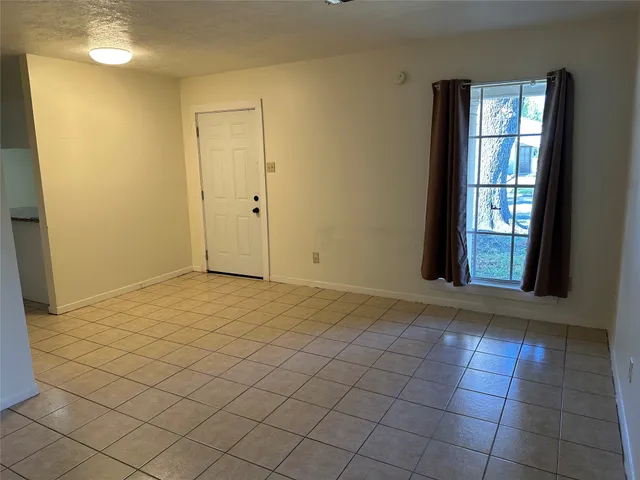 a view of an empty room with window