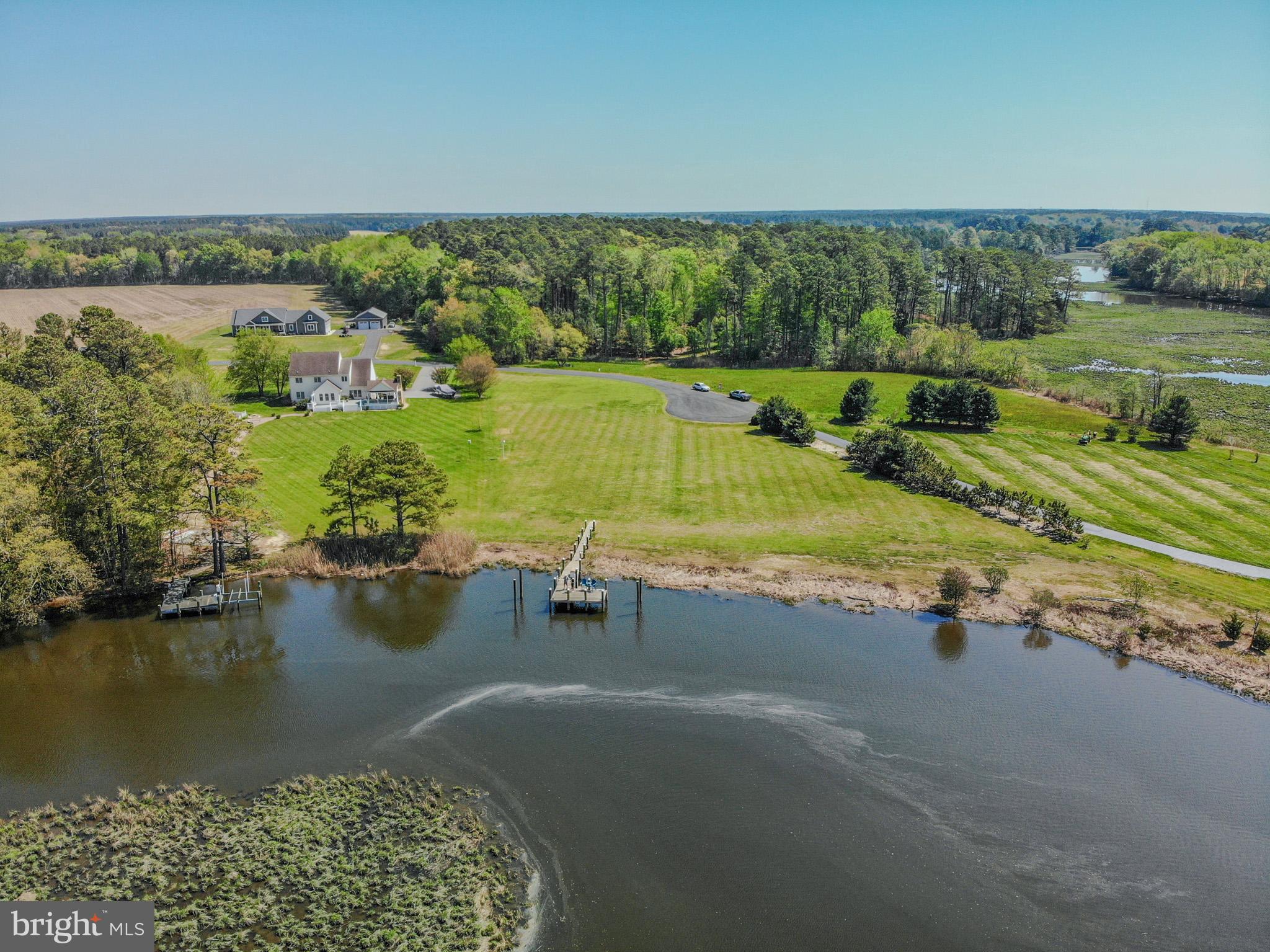 12480 Mallard Landing Road Princess Anne, MD 21853 - Photo 1 of 32 an aerial view of tennis court