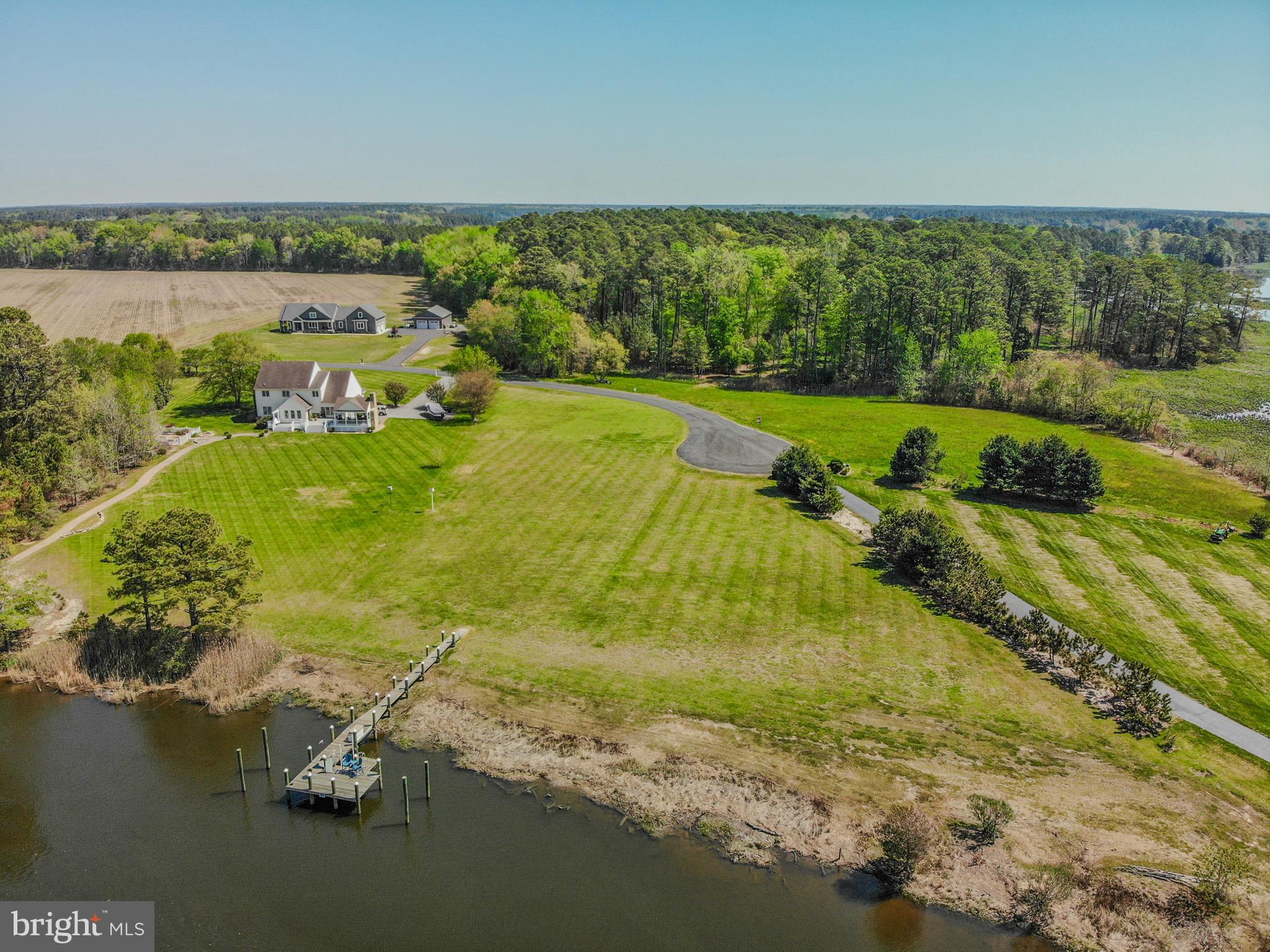 12480 Mallard Landing Road Princess Anne, MD 21853 - Photo 10 of 32 a view of a lake with a city
