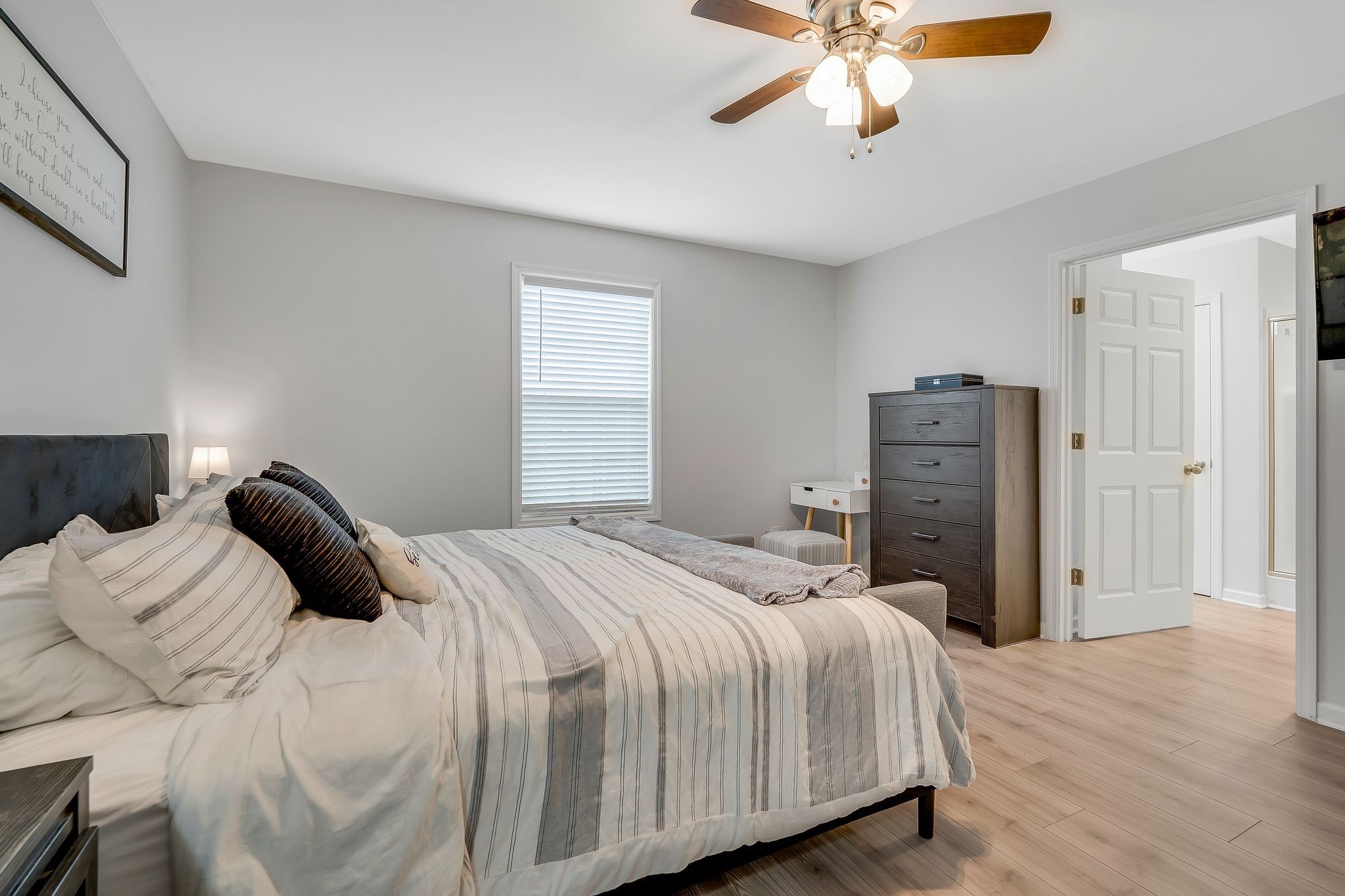1286 Norton Road Manchester, TN 37355 - Photo 14 of 31 a bedroom with a bed and a chandelier