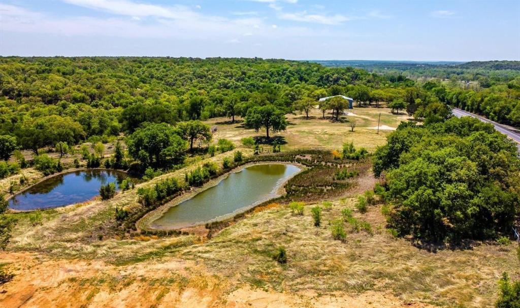 281 Tract 1 Mineral Wells Mineral Wells, TX 76067 - Photo 17 of 23 a view of a lake with outdoor space