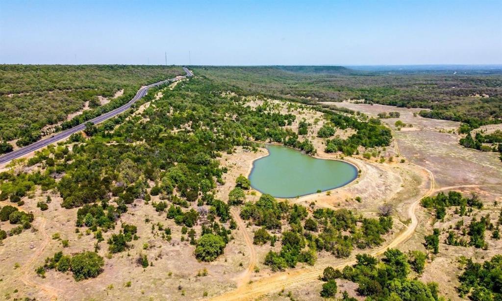 281 Tract 1 Mineral Wells Mineral Wells, TX 76067 - Photo 3 of 23 a view of a outdoor space with a lake view