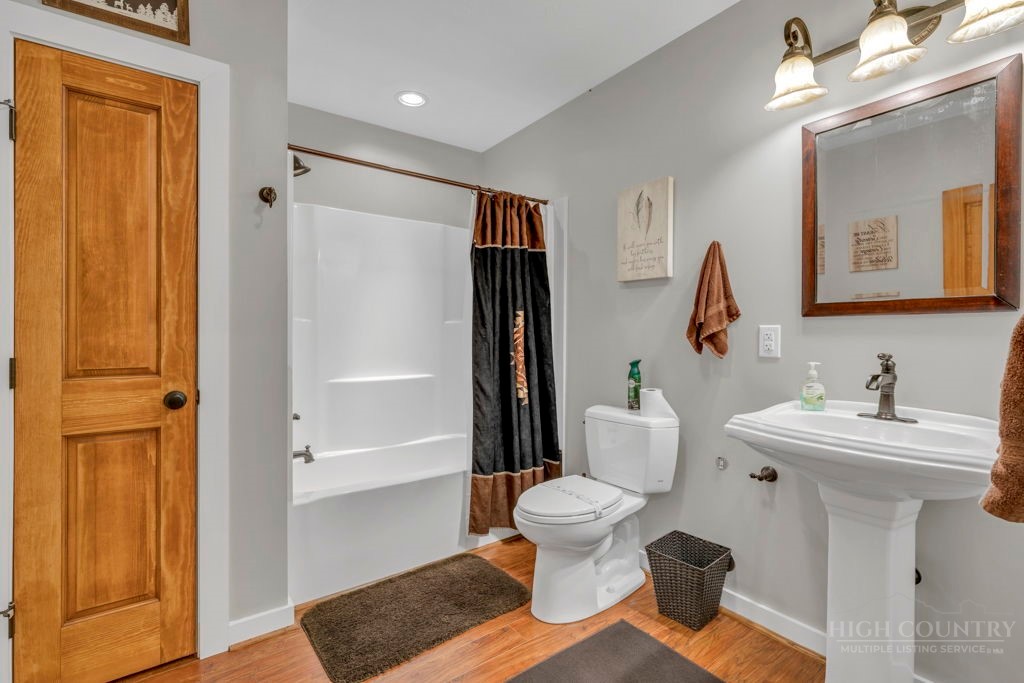 160 Outback Road Ferguson, NC 28624 - Photo 45 of 49 a bathroom with a sink toilet and shower