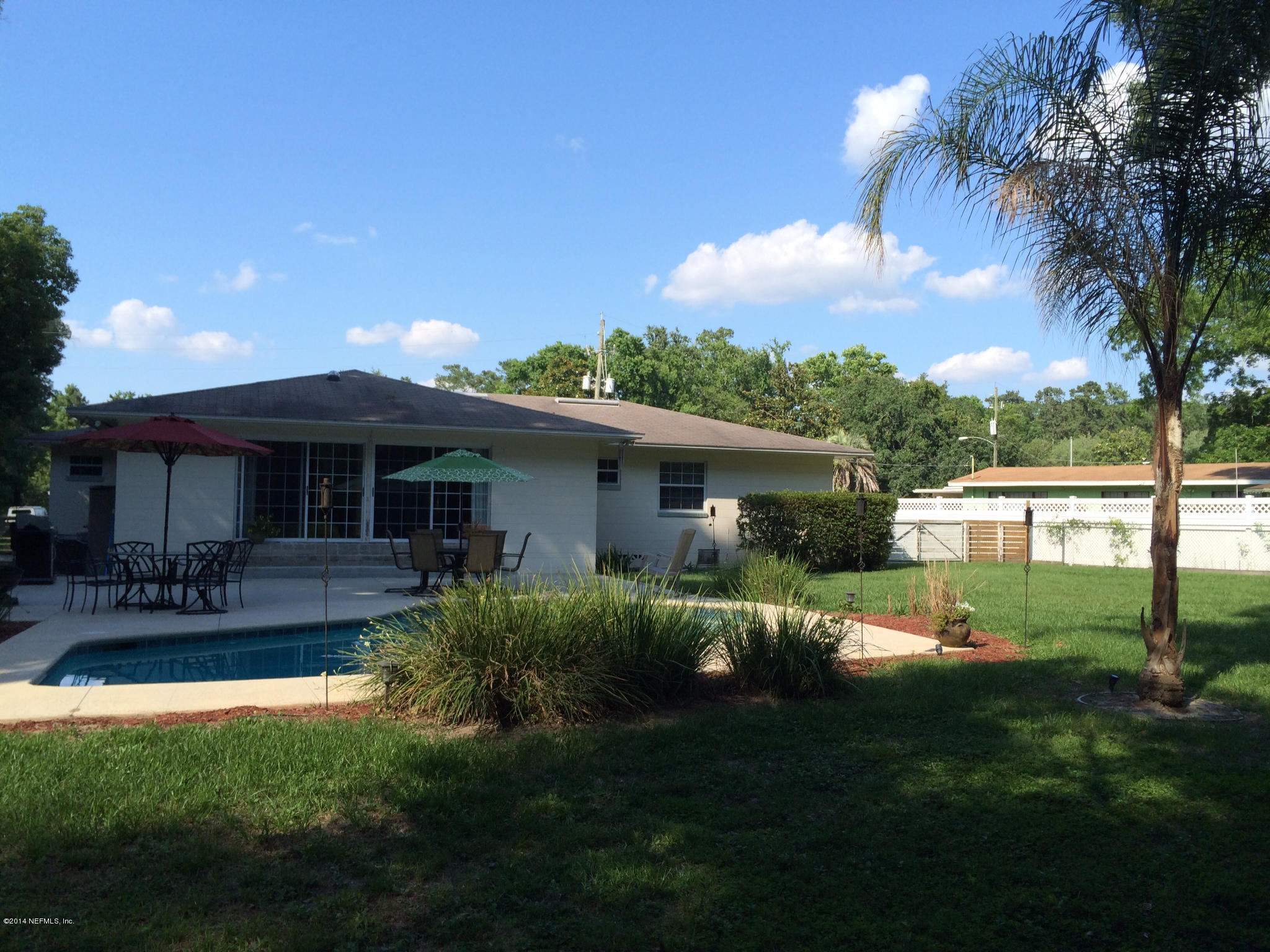 5114 Damascus Road South Jacksonville, FL 32207 - Photo 5 of 12 a front view of house with yard and outdoor seating