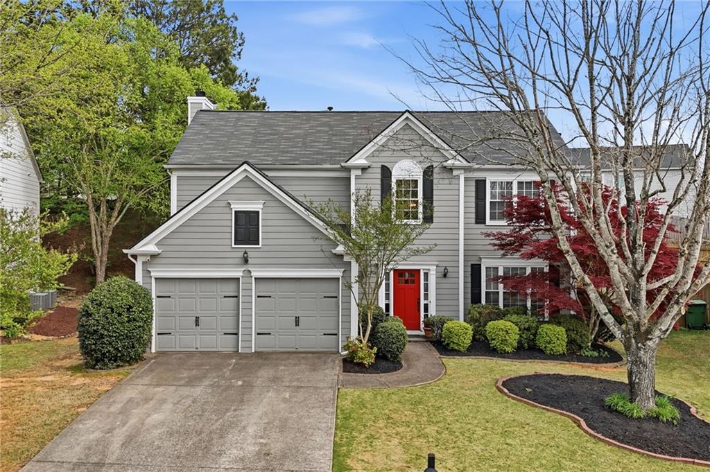 2135 Sugar Maple Lane Northwest Acworth, GA 30101 - Photo 1 of 59 a view of a house with a yard