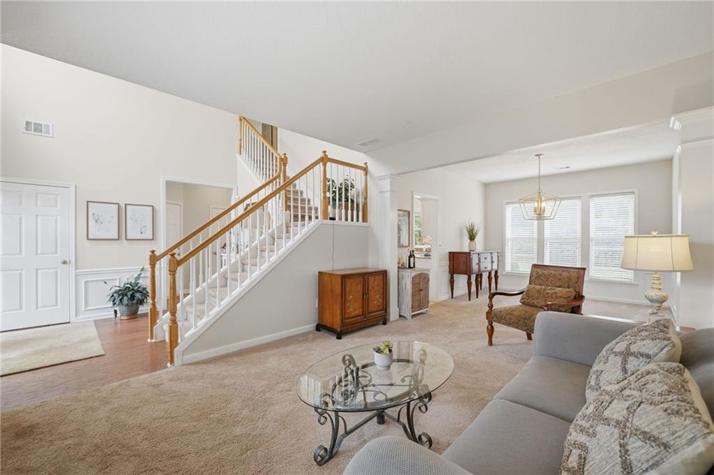 2135 Sugar Maple Lane Northwest Acworth, GA 30101 - Photo 11 of 59 a living room with furniture or stairs and a wooden floor