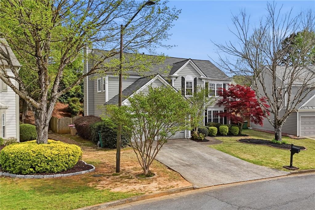 2135 Sugar Maple Lane Northwest Acworth, GA 30101 - Photo 3 of 59 a house view with a garden space