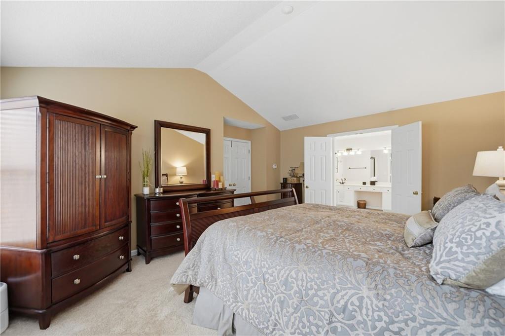 2135 Sugar Maple Lane Northwest Acworth, GA 30101 - Photo 31 of 59 a bedroom with a bed and a dresser