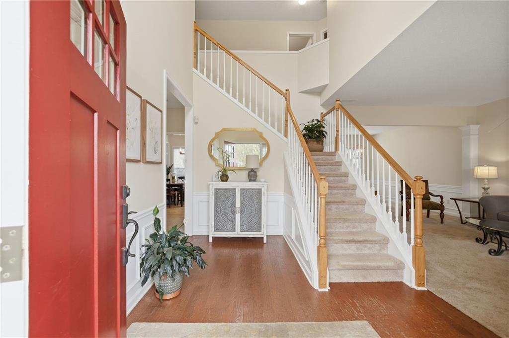 2135 Sugar Maple Lane Northwest Acworth, GA 30101 - Photo 6 of 59 a view of entryway and hall with wooden floor
