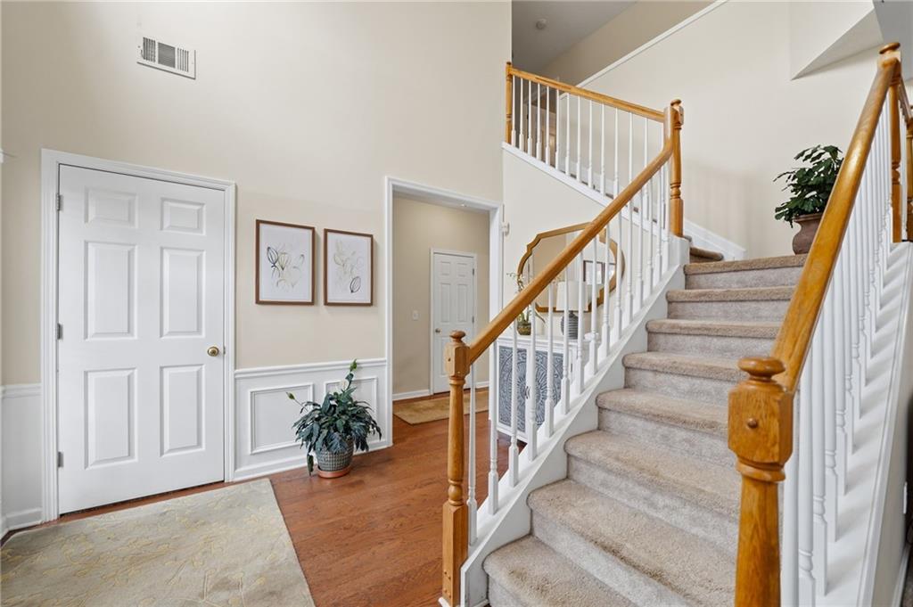 2135 Sugar Maple Lane Northwest Acworth, GA 30101 - Photo 8 of 59 a view of entryway with wooden floor and stairs