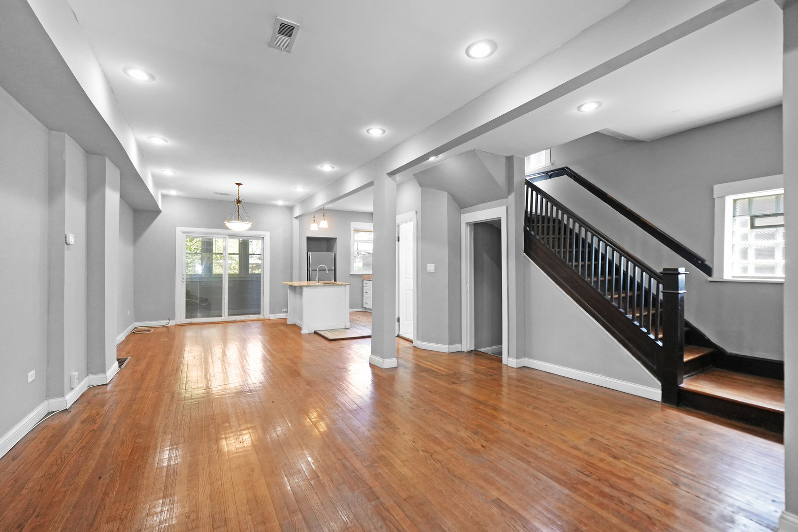 6409 South Champlain Avenue Chicago, IL 60637 - Photo 4 of 33 a view of an entryway with wooden floor