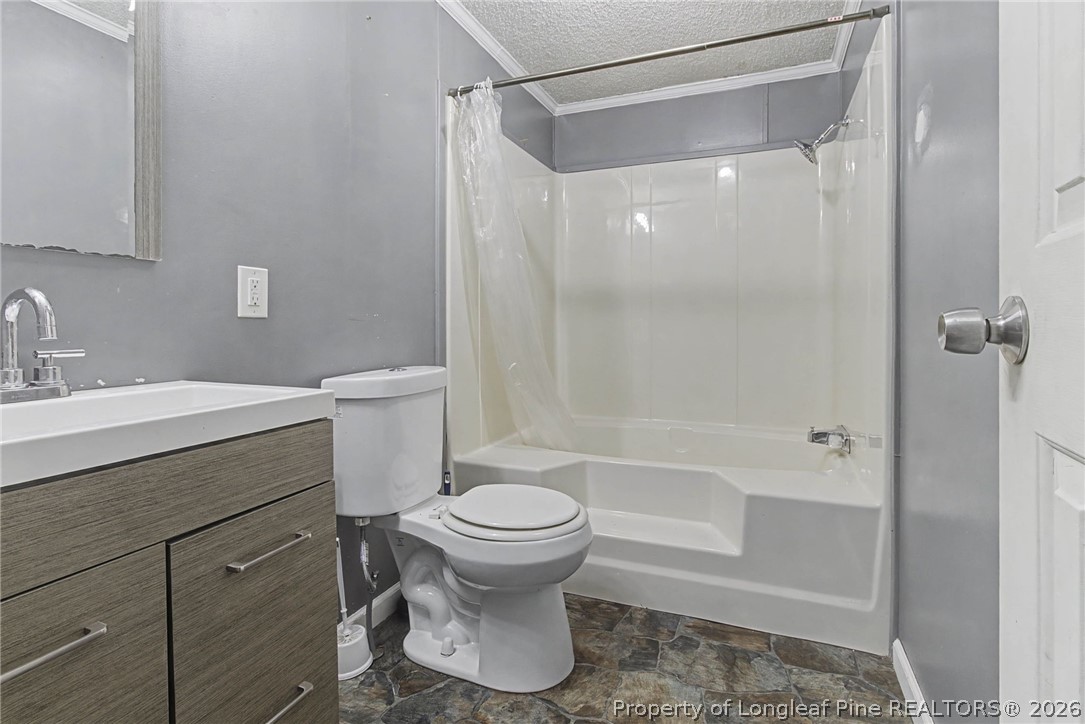 1512 Seabrook School Road Fayetteville, NC 28312 - Photo 12 of 30 a bathroom with a sink toilet and shower