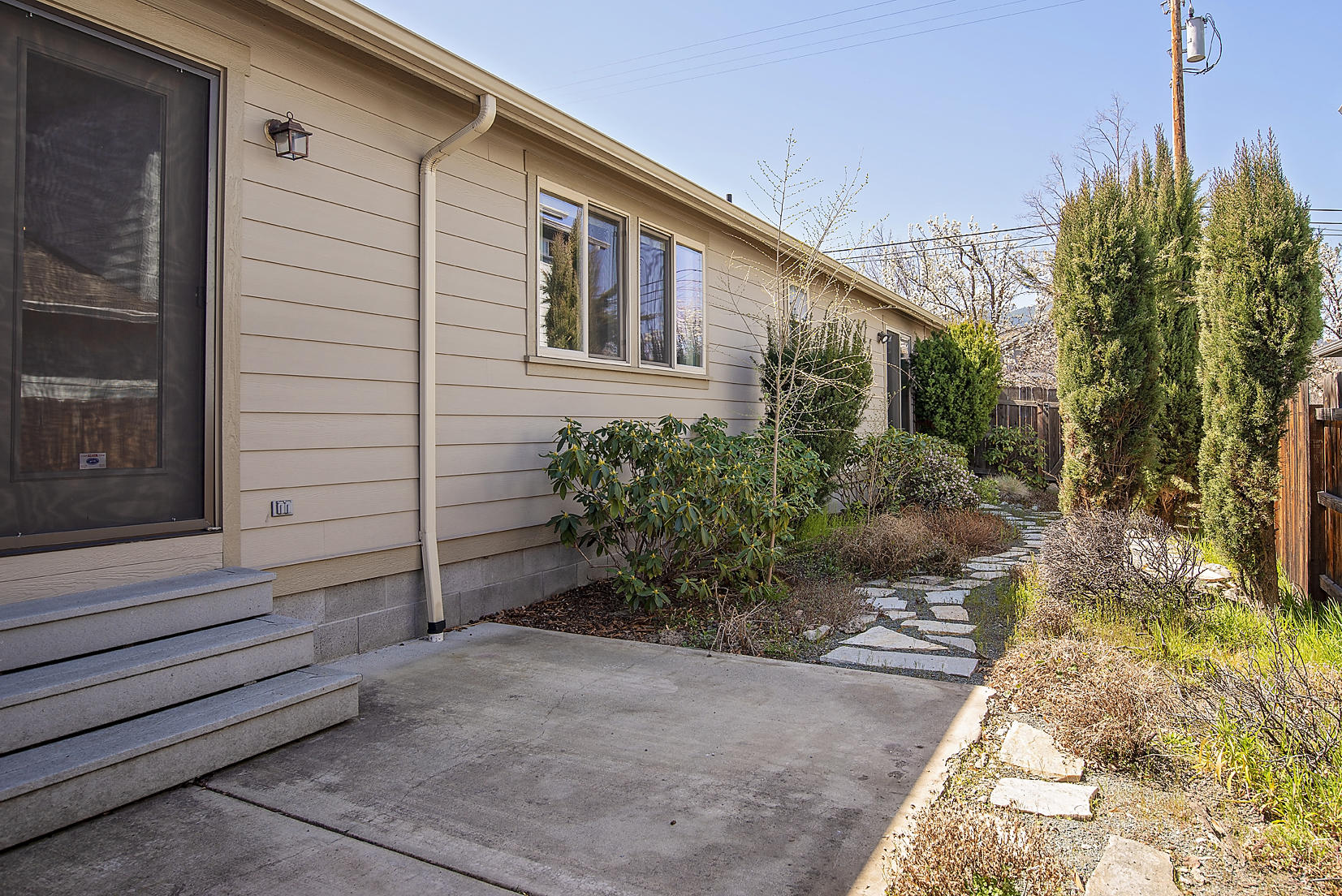 992 Spring Way Ashland, OR 97520 - Photo 18 of 21 a view of a house with backyard and garden