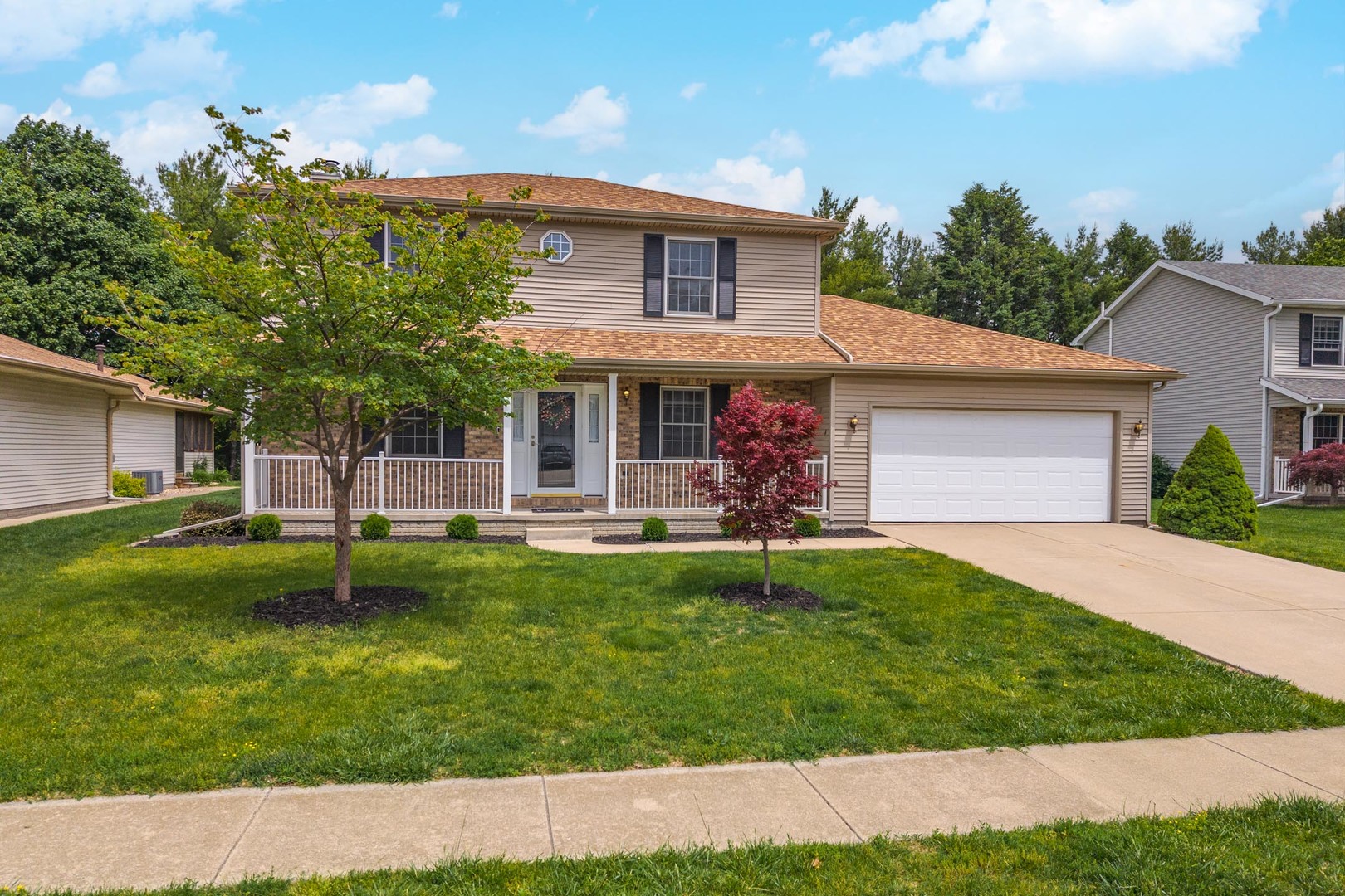 814 Landau Lane Normal, IL 61761 - Photo 49 of 58 a front view of a house with a yard