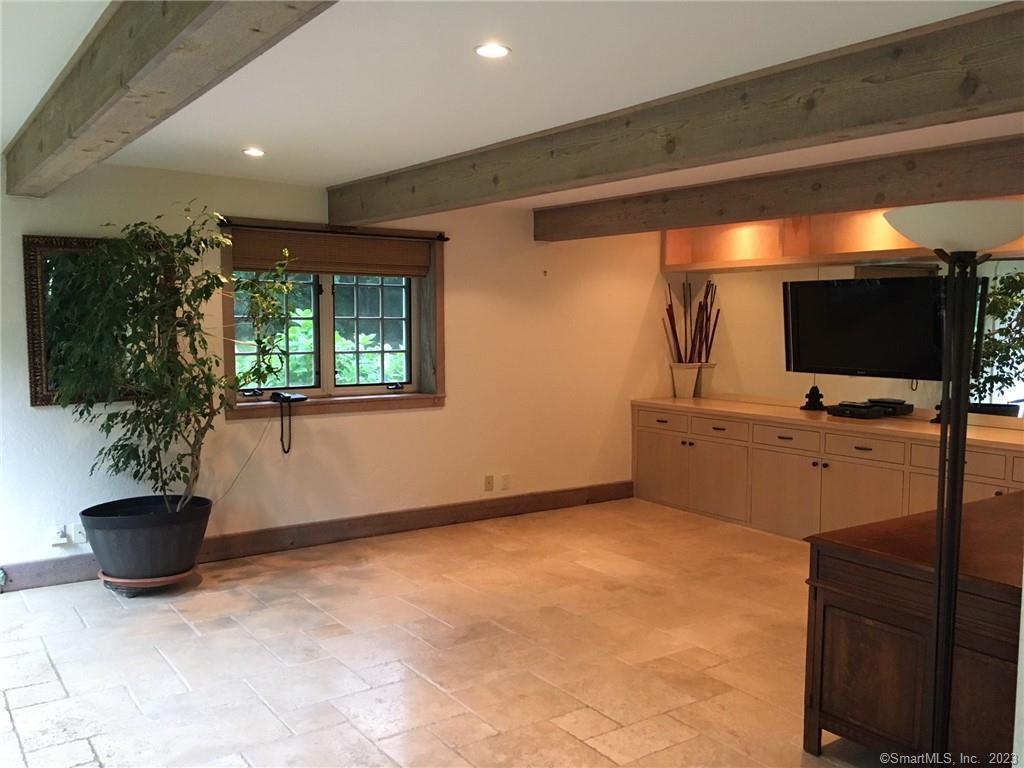 178 Ferris Hill Road New Canaan, CT 06840 - Photo 12 of 19 a room with furniture and a potted plant