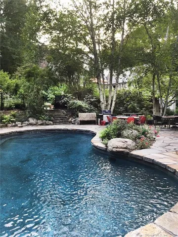 a view of a garden with patio